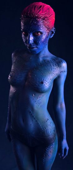 Redhead in cosplay body paint Lisa Dove flaunts her tits and ass